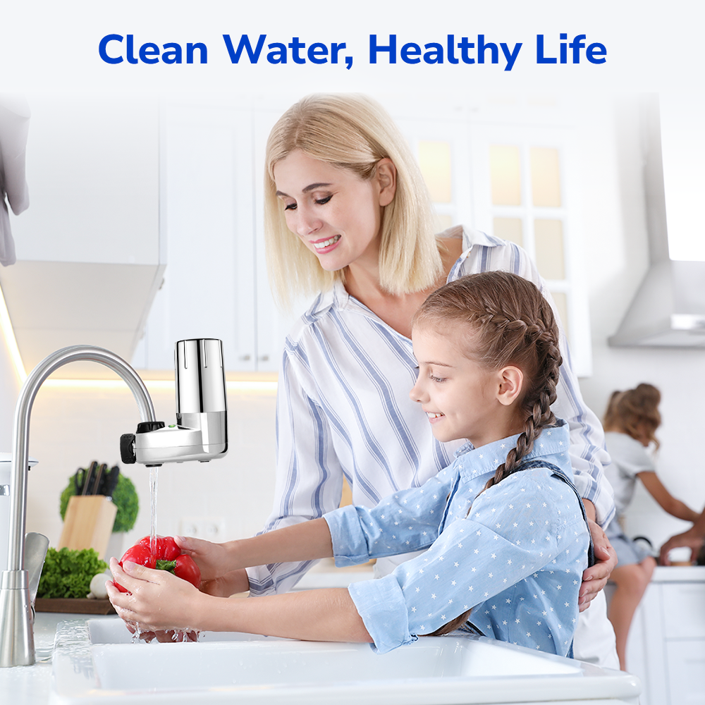 Mother and daughter preparing vegetables together at the sink with clean water using Fil-Fresh faucet filter replacement