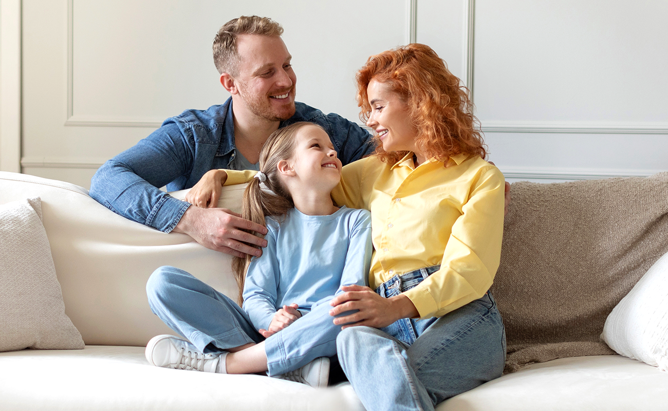Smiling family enjoying healthy living with fresh air and clean water provided by Fil-Fresh’s filtration solutions