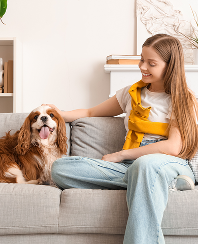 a women enjoy the moments with her furry friends without the bother of pet dander and odors