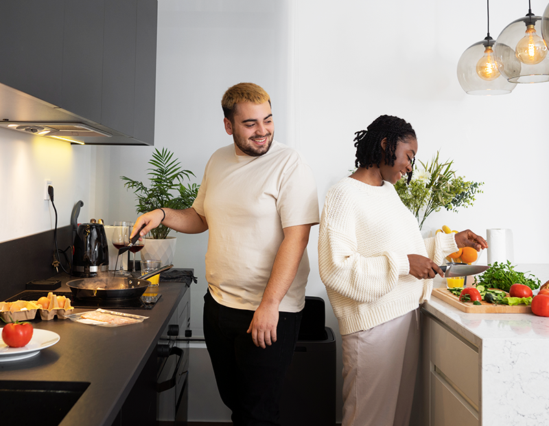 couples cooking together in the kitchen, Fil-Fresh air purifier filter replacement removes smoke, cooking smells, and other odors quite well