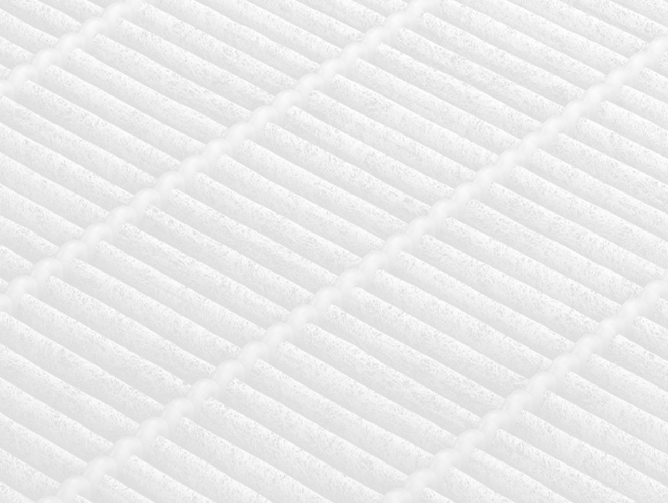 Detailed view of Fil-Fresh H13 True HEPA filter capturing 99.97% of airborne particles down to 0.3 microns