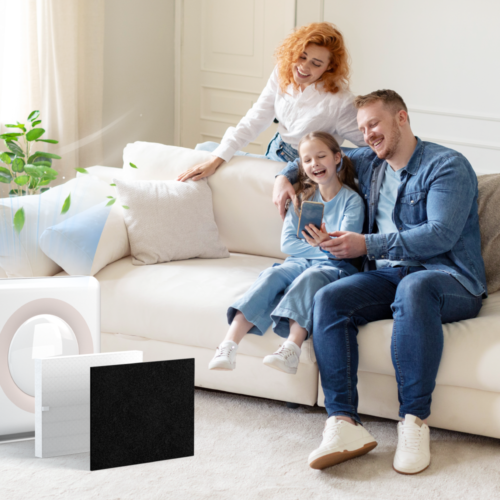 Family of three on the couch enjoying a relaxing moment and clean air while looking at a phone with Fil-Fresh air purifier filters