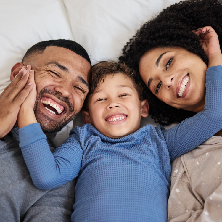 Bright smiles from one of the many families who trust Fil-Fresh, lying close together