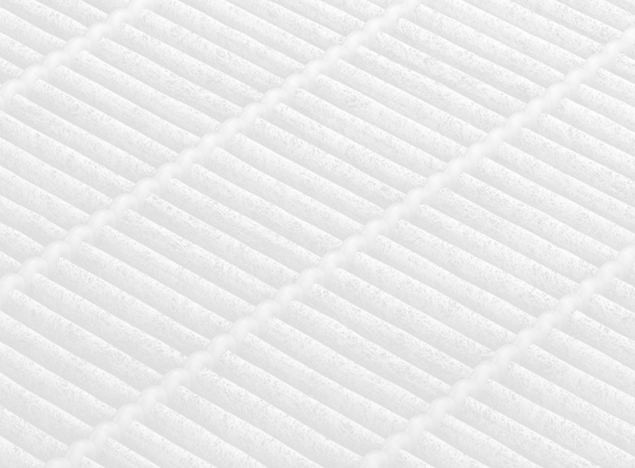 Detailed view of Fil-Fresh H13 True HEPA filter capturing 99.97% of airborne particles down to 0.3 microns